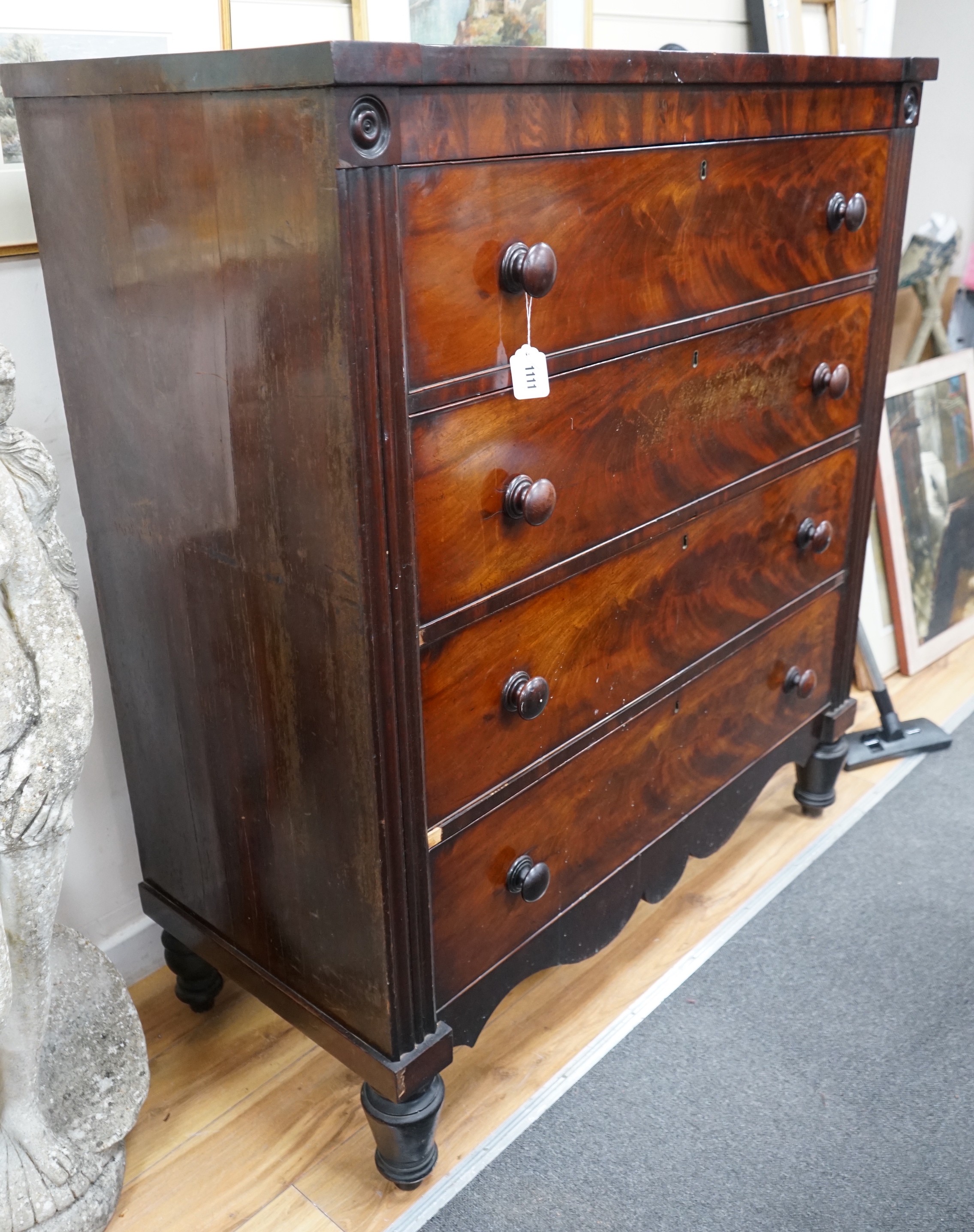 An early Victorian mahogany chest of four drawers, width 121cm, depth 53cm, height 134cm